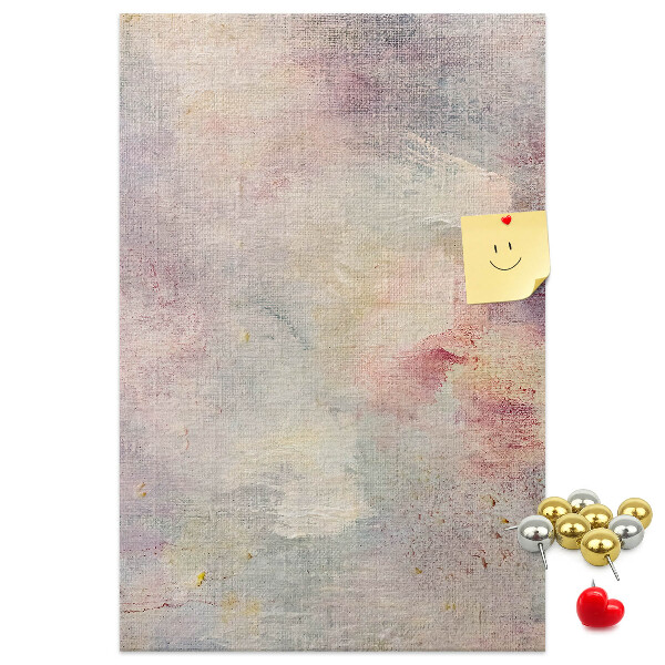 Pinnwand mit zarten Pastellflecken im Hintergrund