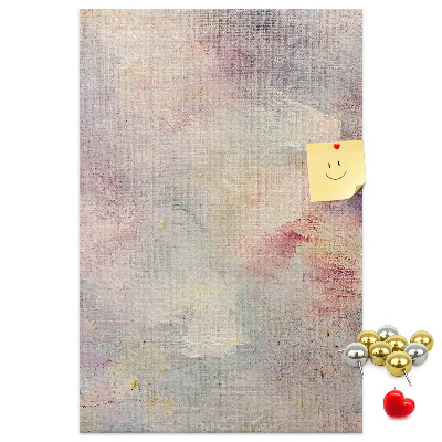 Pinnwand mit zarten Pastellflecken im Hintergrund