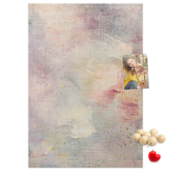 Pinnwand mit zarten Pastellflecken im Hintergrund