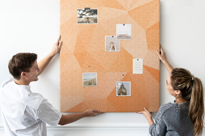 Bedruckte Korkplatte mit geometrischen Mustern in Orange- und Beigetönen