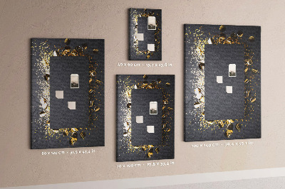 Pinnwand mit goldenen und silbernen Akzenten auf schwarzem Hintergrund