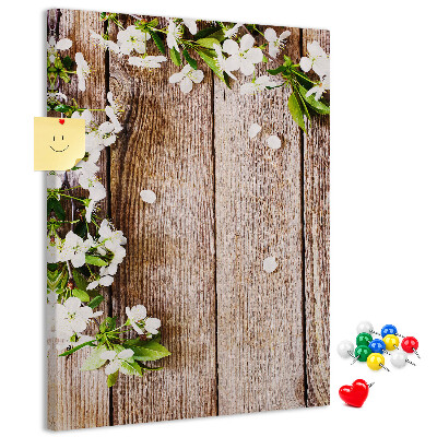 Pinnwand mit Motiv Blumen auf einem Hintergrund aus Holzbrettern