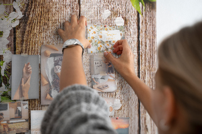 Pinnwand mit Motiv Blumen auf einem Hintergrund aus Holzbrettern