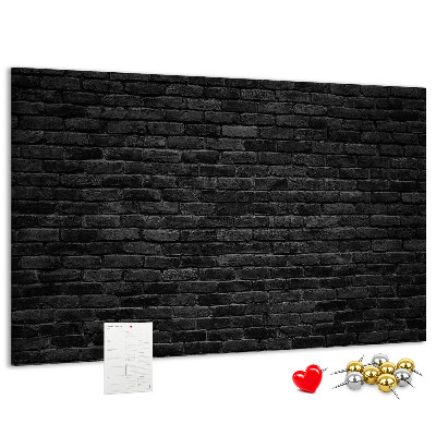 Bild mit Korkrückwand Nahaufnahme einer dunklen strukturierten Backsteinwand
