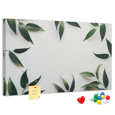 Bild mit Korkrückwand Blätter in einem zarten, minimalistischen Arrangement