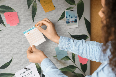 Bild mit Korkrückwand Blätter in einem zarten, minimalistischen Arrangement