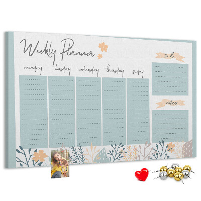 Korkpinnwand mit Blumenmuster und Wochenplan