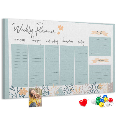 Korkpinnwand mit Blumenmuster und Wochenplan