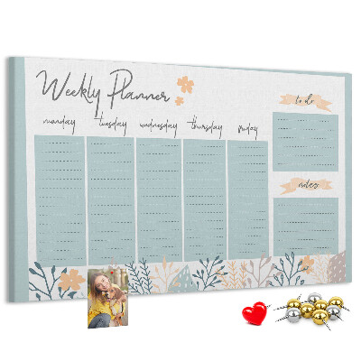 Korkpinnwand mit Blumenmuster und Wochenplan