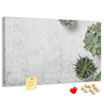 Korktafel mit Motiv Topfpflanzen auf grauem Hintergrund