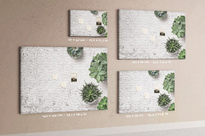 Korktafel mit Motiv Topfpflanzen auf grauem Hintergrund