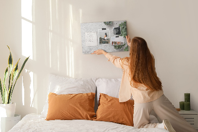 Korktafel mit Motiv Topfpflanzen auf grauem Hintergrund