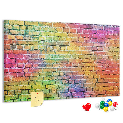 Korkbild mit buntem Backsteinmauer-Motiv im Regenbogen-Design