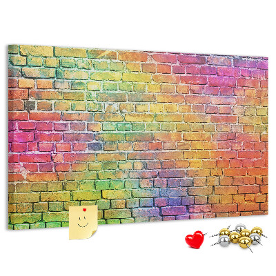 Korkbild mit buntem Backsteinmauer-Motiv im Regenbogen-Design