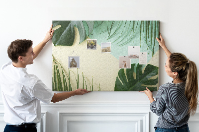 Kork-Pinnwand mit Motiv tropische Blätter auf pastellfarbenem Hintergrund
