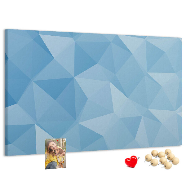 Korkbild mit geometrischen blauen Dreiecken in verschiedenen Schattierungen