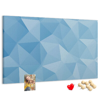 Korkbild mit geometrischen blauen Dreiecken in verschiedenen Schattierungen