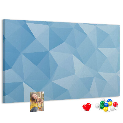 Korkbild mit geometrischen blauen Dreiecken in verschiedenen Schattierungen