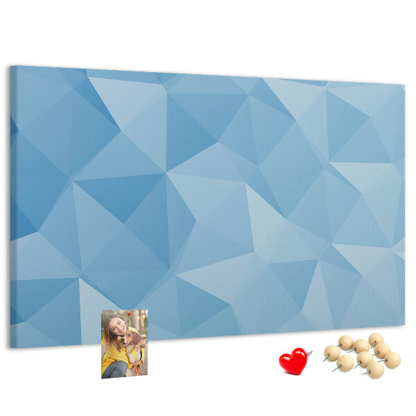 Korkbild mit geometrischen blauen Dreiecken in verschiedenen Schattierungen