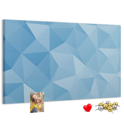 Korkbild mit geometrischen blauen Dreiecken in verschiedenen Schattierungen