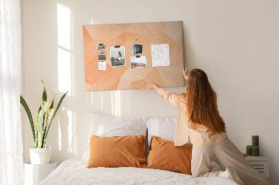 Kork-Pinnwand mit geometrischem Dreiecksmuster in Orangetönen