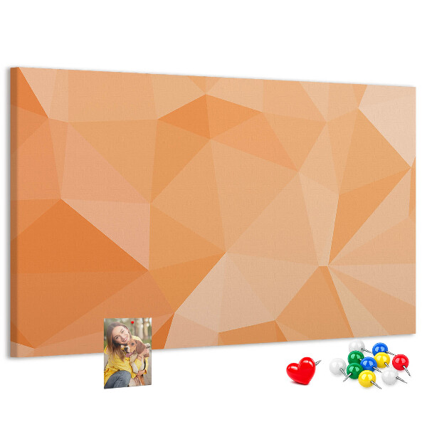 Kork-Pinnwand mit geometrischem Dreiecksmuster in Orangetönen