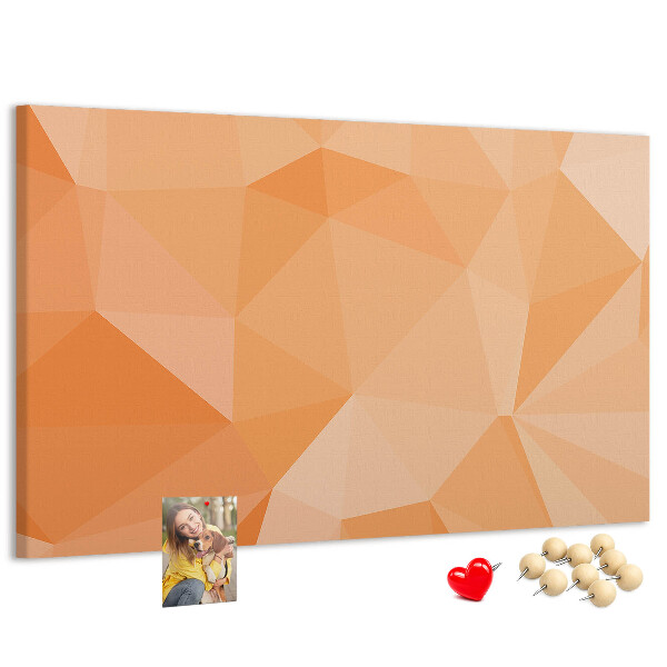 Kork-Pinnwand mit geometrischem Dreiecksmuster in Orangetönen