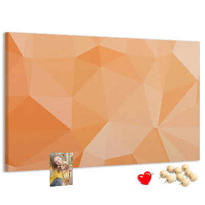Kork-Pinnwand mit geometrischem Dreiecksmuster in Orangetönen