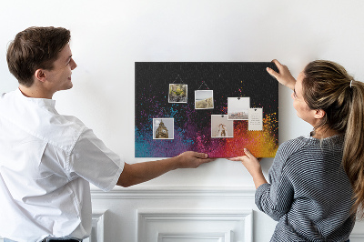 Bild mit Korkrückwand eine Farbexplosion auf schwarzem Hintergrund