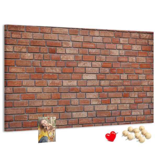 Korktafel mit Motiv Backsteinmauer in warmen Farbtönen
