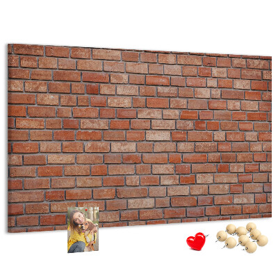 Korktafel mit Motiv Backsteinmauer in warmen Farbtönen