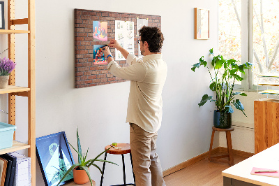 Korktafel mit Motiv Backsteinmauer in warmen Farbtönen