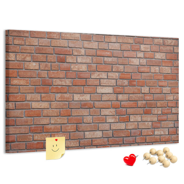 Korktafel mit Motiv Backsteinmauer in warmen Farbtönen