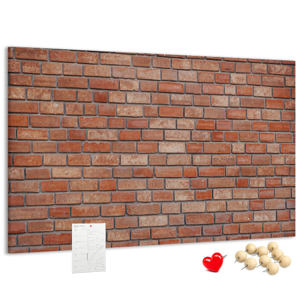Korktafel mit Motiv Backsteinmauer in warmen Farbtönen