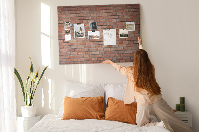 Korktafel mit Motiv Backsteinmauer in warmen Farbtönen
