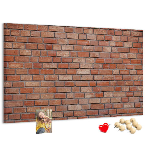 Korktafel mit Motiv Backsteinmauer in warmen Farbtönen