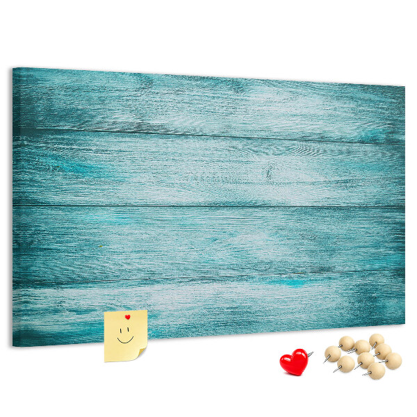Korktafel mit grünem und blauem Holzbrett-Hintergrund