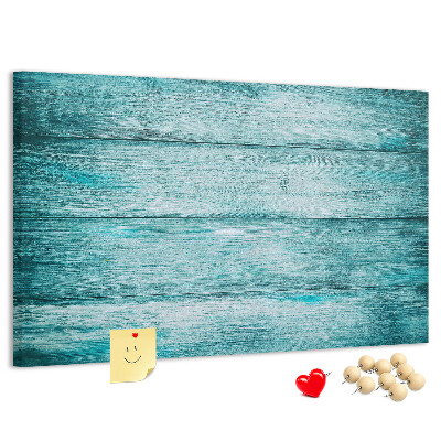 Korktafel mit grünem und blauem Holzbrett-Hintergrund