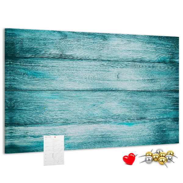 Korktafel mit grünem und blauem Holzbrett-Hintergrund