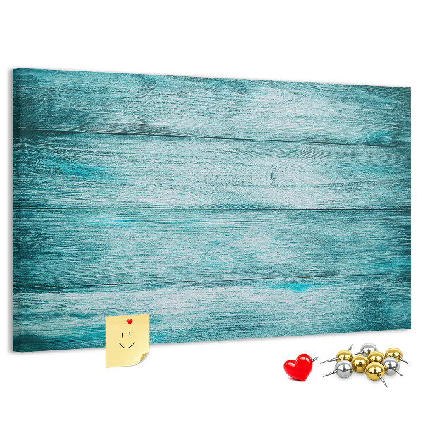 Korktafel mit grünem und blauem Holzbrett-Hintergrund