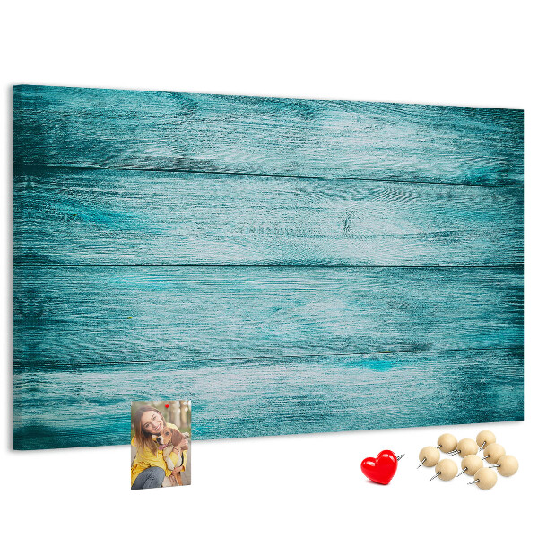 Korktafel mit grünem und blauem Holzbrett-Hintergrund