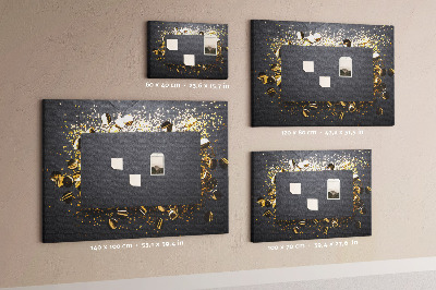 Korkbild goldenes Konfetti auf schwarzem Hintergrund