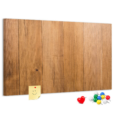 Korkbild mit farbigen Stecknadeln auf Holzbrett
