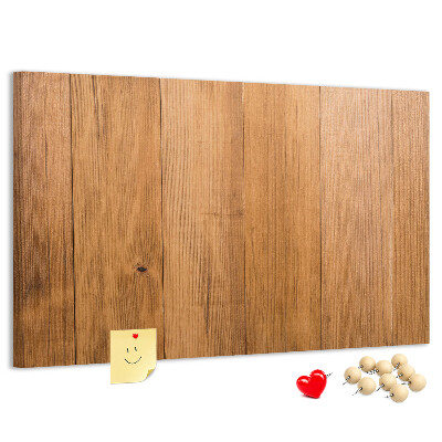Korkbild mit farbigen Stecknadeln auf Holzbrett