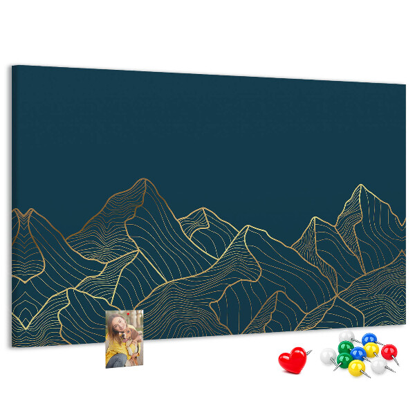 Kork-Pinnwand mit goldenen Bergumrissen auf dunklem Hintergrund