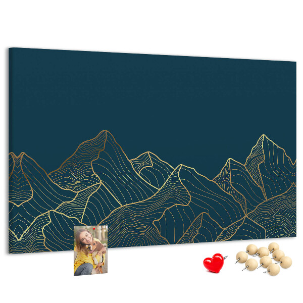 Kork-Pinnwand mit goldenen Bergumrissen auf dunklem Hintergrund