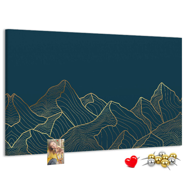 Kork-Pinnwand mit goldenen Bergumrissen auf dunklem Hintergrund