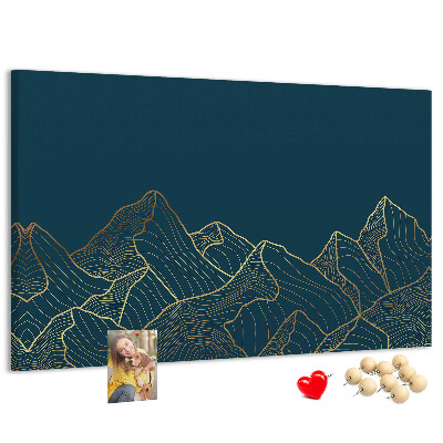 Kork-Pinnwand mit goldenen Bergumrissen auf dunklem Hintergrund