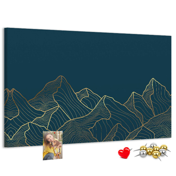Kork-Pinnwand mit goldenen Bergumrissen auf dunklem Hintergrund