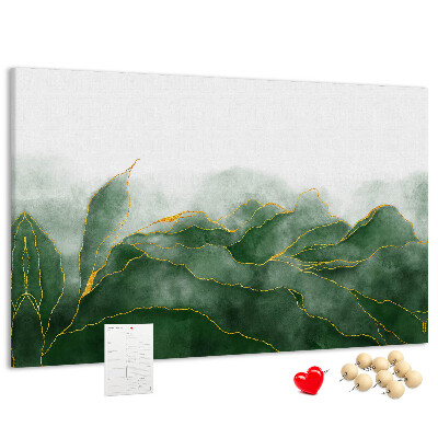 Bilder mit Korkrückwand goldene Akzente auf grünen Blättern